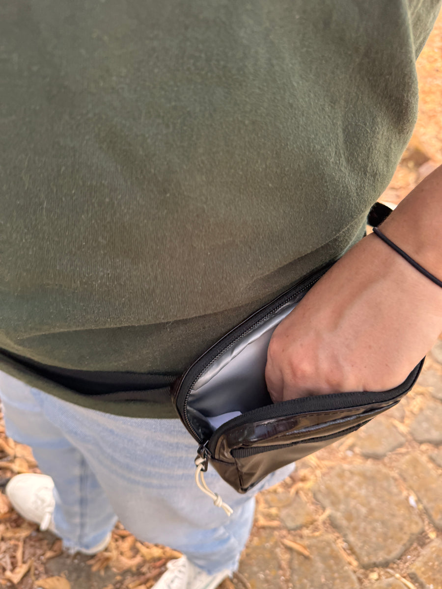 Treat Pouch in Black on a customer outing