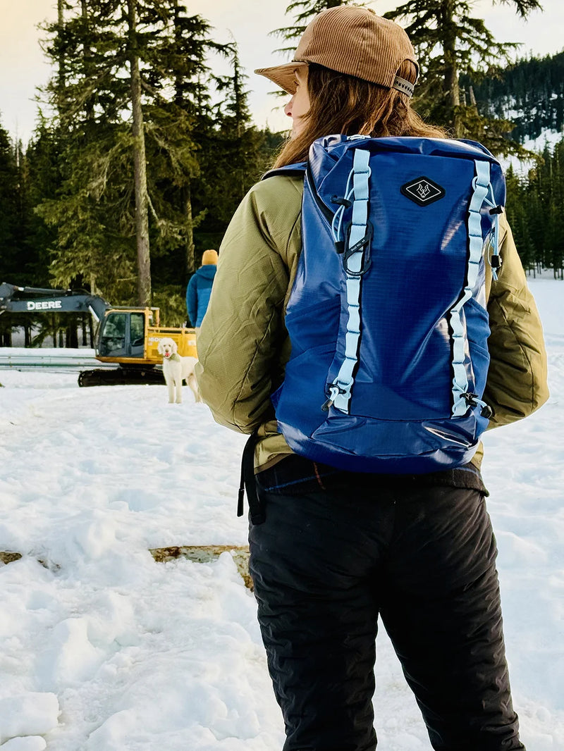 Wolf Stride dog adventure backpack used during winter hiking and outdoor activities